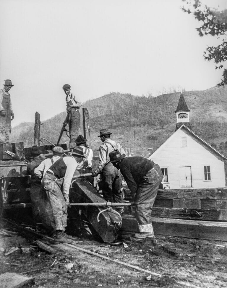 Railroad tracks being removed, with RBC in the background. 1933