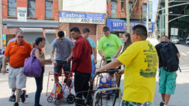 Handing Out Lunches To Homeless Handing Out Lunches To Homeless